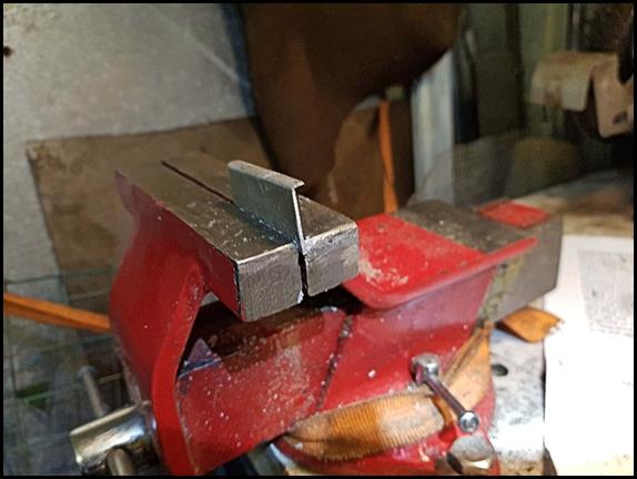 A picture containing tool, metalworking, machine, indoor