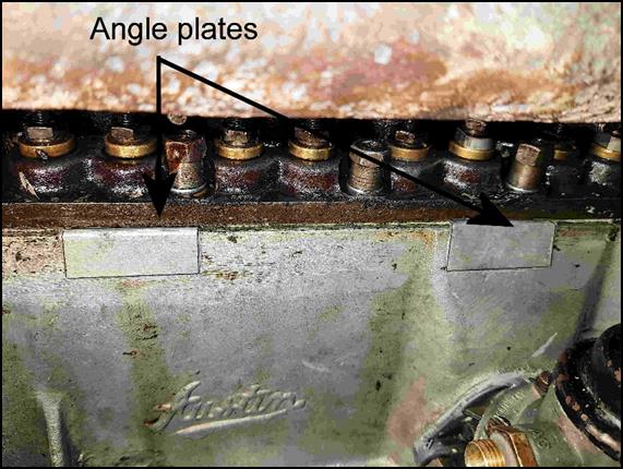 A picture containing rust, auto part, abandoned, decay

Description automatically generated